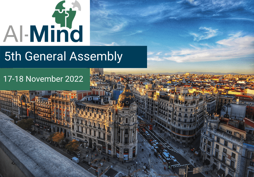 Crossing and buildings in Madrid and the AI-Mind logo with the text 5th General Assembly