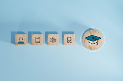 Student icons on wooden blocks Education concept